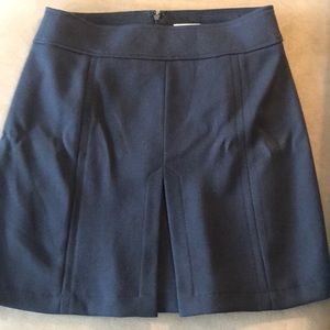 Navy blue lined skirt with pleat detail